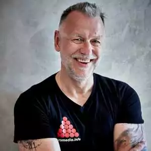 Klaus Schenkmannn lacht in die Kamera - fotografiert von Reinhard Rosendahl