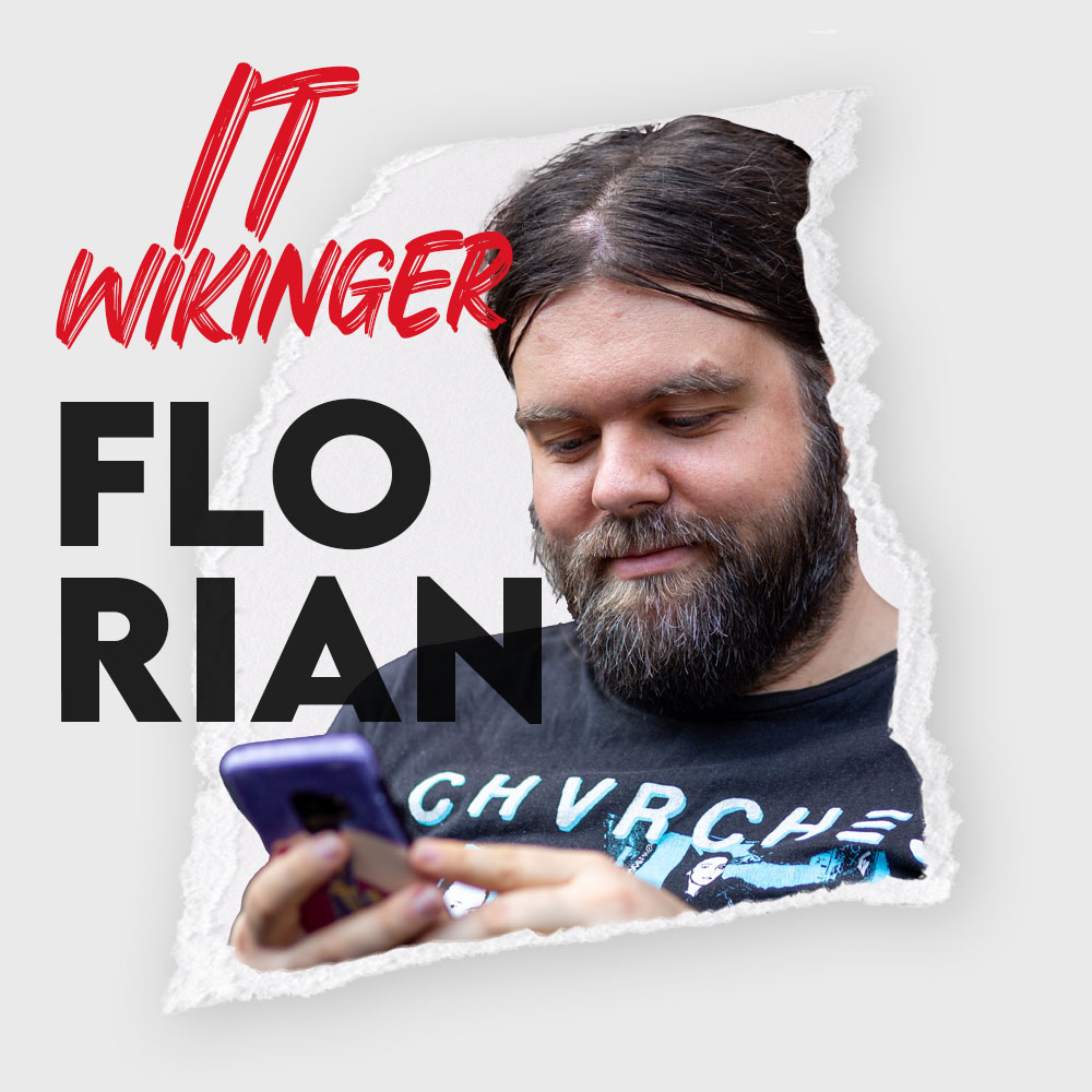 Florian, IT-Wikinger, mit Smartphone in der Hand, Bart und T‑Shirt „CHVRCH“ im Bild